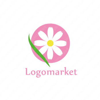花と円とピンクのロゴ