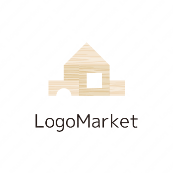 積み木と家とパステルカラーのロゴ