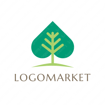 木と成長とスペードのロゴ