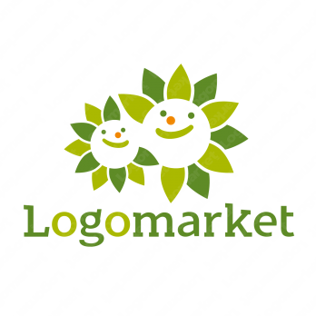 緑と葉とキャラクターのロゴ