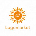 太陽と笑顔と明るいのロゴ