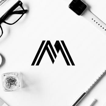 高級感と山とMのロゴ