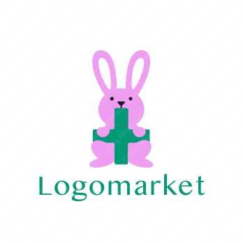 ウサギと十字とキャラクターのロゴ