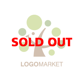 木と笑顔とスマイルのロゴ