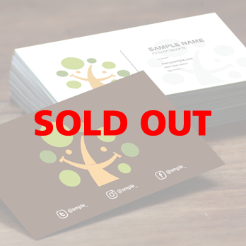 木と笑顔とスマイルのロゴ