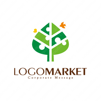 木と鳥と葉のロゴ
