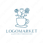 コーヒーカップと花と手書きのロゴ