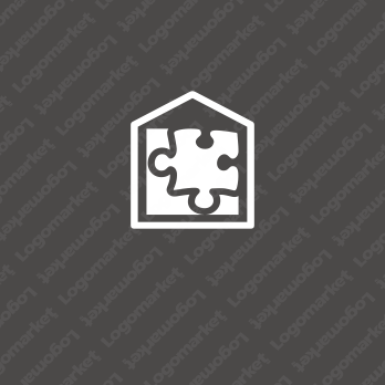 家とパズルと創造的のロゴ
