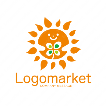 太陽と四つ葉とキャラクターのロゴ