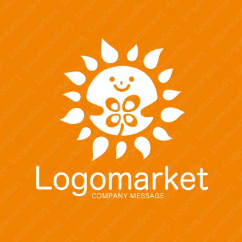 太陽と四つ葉とキャラクターのロゴ