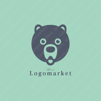クマと歯とキャラクターのロゴ