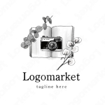 本とカメラと手書きのロゴ