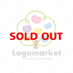 個性と木とハートのロゴ