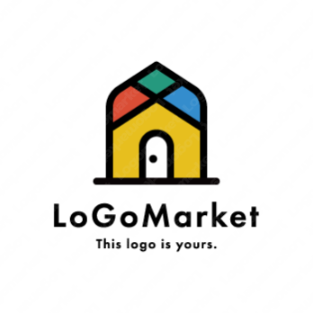 家とカラフルと建物のロゴ