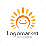 太陽と笑顔と親しみやすいのロゴ