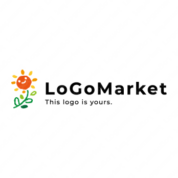 太陽と植物と花のロゴ
