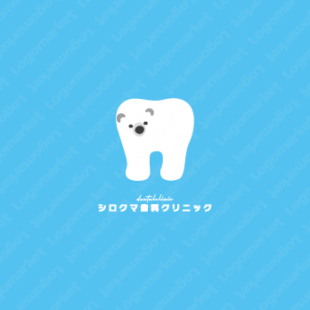 歯のシルエットと優しいとキャラクターのロゴ