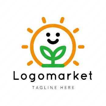 太陽と双葉と笑顔のロゴ