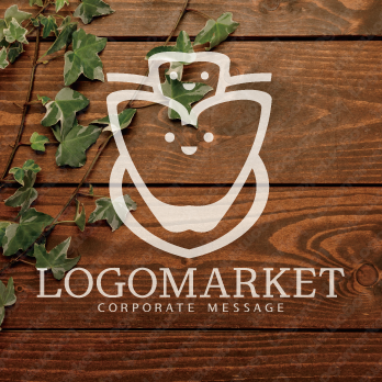 歯とクリニックとキャラクターのロゴ