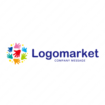 手とカラフルと自由のロゴ