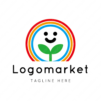 虹と双葉と笑顔のロゴ