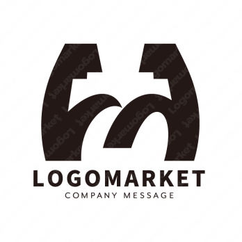 Mとマッスルと筋肉のロゴ