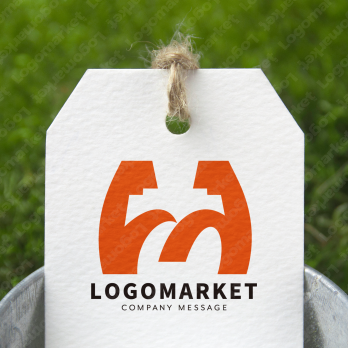 Mとマッスルと筋肉のロゴ