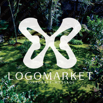 蝶と羽ばたくと成長のロゴ