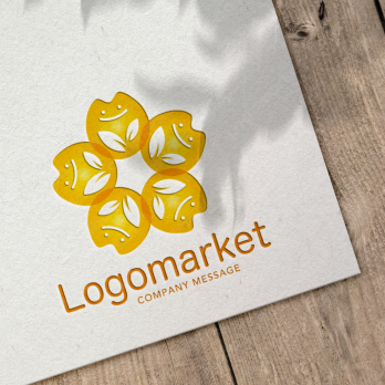 笑顔と花と温かいのロゴ