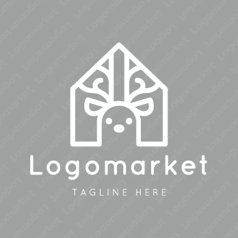 鹿と家と歯科のロゴ