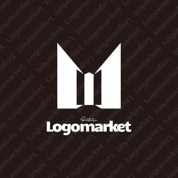 先進的とビルとMのロゴ