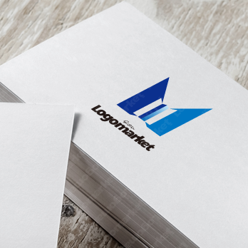 先進的とビルとMのロゴ