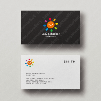 太陽と笑顔と虹のロゴ