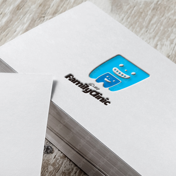 永久歯と乳歯と親子のロゴ