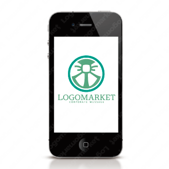 リボンと円とキュートのロゴ