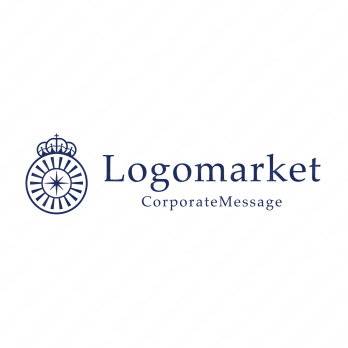 光とエンブレムと王冠のロゴ