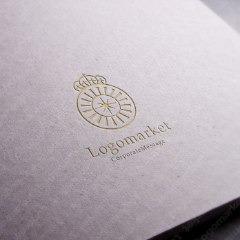 光とエンブレムと王冠のロゴ