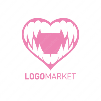 牙とハートとビーストのロゴ