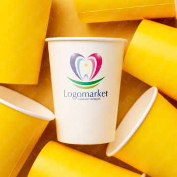 Mとハートと歯科のロゴ