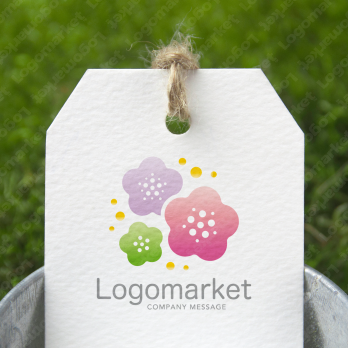 梅の花と優しいと喜びのロゴ