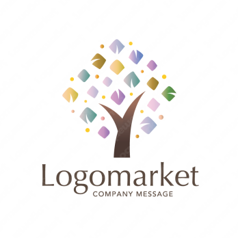 木と輝きとキラキラのロゴ