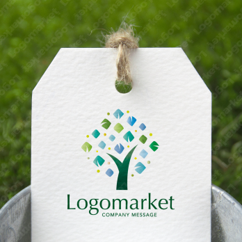 木と輝きとキラキラのロゴ