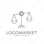 天秤と太陽とシンプルのロゴ