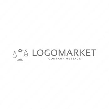 天秤と太陽とシンプルのロゴ