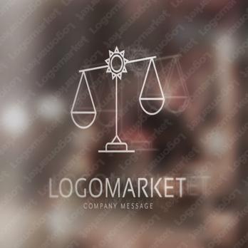 天秤と太陽とシンプルのロゴ