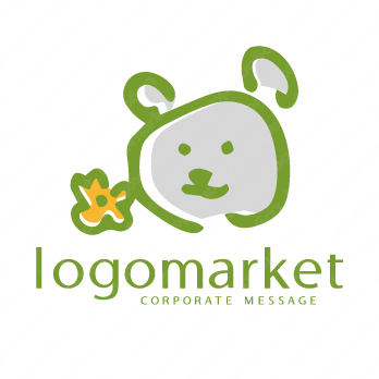 くまと花と手書きのロゴ