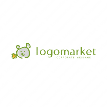 くまと花と手書きのロゴ