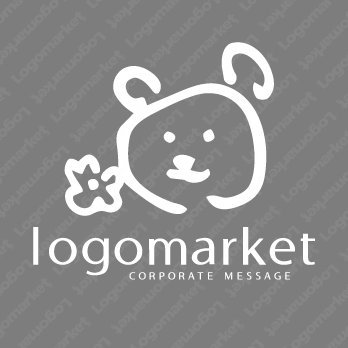 くまと花と手書きのロゴ