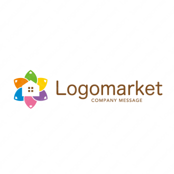 家とカラフルとポジティブのロゴ