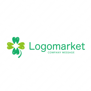 歯科と四つ葉と安心感のロゴ